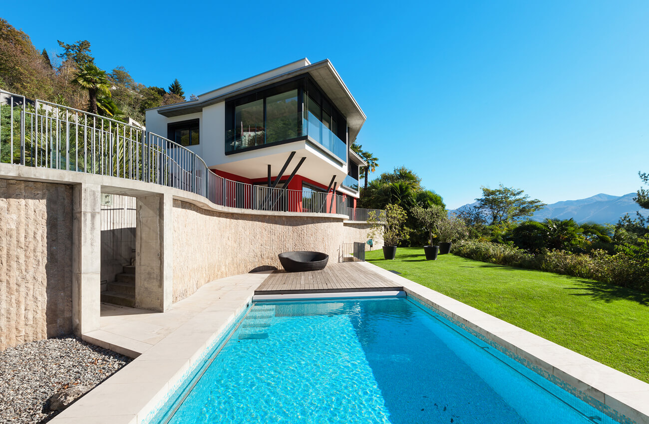 Maison individuelle en Suisse - Tessin - avec piscine et vue sur les montagnes, header properti Blog